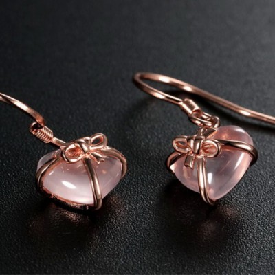 Boucles d'oreilles nœud papillon rose scintillant en forme de cœur